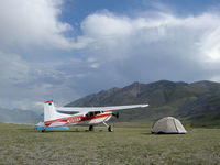 N180AH - setting camp at Spring Creek Alaska - by Arthur Haefliger