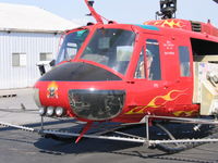 N891PM - Nose art on Porter FS 1971 Bell UH-1H sprayer (71-20012) near Durham, CA - by Steve Nation