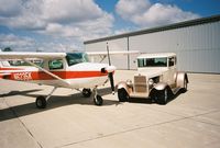 N6235K @ KIKV - Cessna 150 & 1930 Model A Streetrod - by Larry L Miller