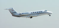 N18GB @ PDK - Departing PDK - Starting to rotate gear. - by Michael Martin