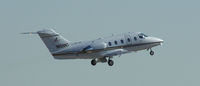 N109NT @ PDK - Departing PDK - Starting to rotate gear. - by Michael Martin