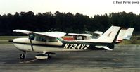 N734VZ @ ASJ - All lined up on the apron. - by Paul Perry