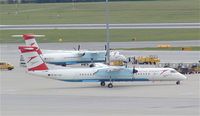 OE-LGC @ VIE - Austrian Arrows' new livery gives these DHC-8's a striking look! - by Andreas Mowinckel
