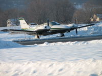 N33436 @ SEG - Sitting on the ramp after a good snow - by Sam Andrews