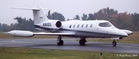 N911DX @ BUY - Making her way to the ramp on a rainy day. - by Paul Perry