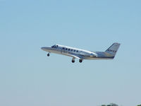 N341CS @ PDK - Departing PDK - Starting to rotate gear. - by Michael Martin