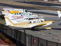N4256R @ PDK - Tied down @ PDK with vairous AC in background - by Michael Martin