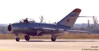 N217SH @ GSB - A pristine MiG, prowling for a parking spot