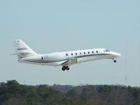 N680CG @ PDK - Departing PDK - Starting to rotate gear. - by Michael Martin