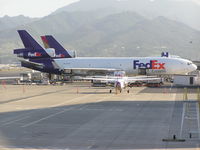 N624FE @ PHNL - MD-11 on cargo ramp. south side of Honolulu Intl. - by John J. Boling