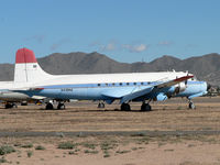N438NA @ FFZ - One of several DC-4s parked at Falcon Field
