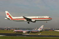 CS-TJF @ BRU - landing of TAP A321 while N351AA - flight AA89 - waits to take-off to ORD