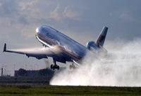 PH-MCY @ EHAM - Rain, sun and wet runway creats nice moments - by Jeroen Stroes