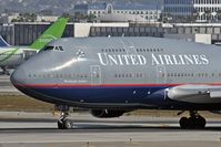 N117UA @ LAX - After landing on RWY 25L. - by Dean Heald