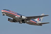 N320AA @ LAX - Departing RWY 25R on a sunny Valentine's Day afternoon. - by Dean Heald