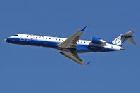 N718SK @ LAX - N718SK explus departing RWY 25R on a clear November day.  I'm partial to the CRJ-700 since I was involved in the wind tunnel testing of this aircraft.
