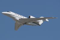 N704LX @ LAX - Target Corporation N704LX - Cessna 750 Citation X - departing LAX RWY 25R.