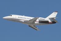 N265QS @ LAX - N265QS - Dassault Falcon 2000 - Bravo Golf Management LLC - departing RWY 25R. - by Dean Heald
