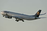D-AIGT @ LAX - Lufthansa B-AIGT (Airbus A340-313) departing LAX RWY 25R on a late afternoon in February 2006. Note the condensation trail originating from the left winglet.