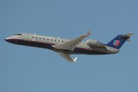 N934SW @ LAX - United Express- N934SW (CRJ-200ER) departing LAX RWY 25R.
