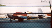 N1ZL @ PHF - Fences...good for safety, but bad for photography.  Well kept Mooney was just too much of an enticement - by Paul Perry