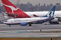 N267AT @ LAX - AirTran N267AT taxiing to RWY 7L for departure.