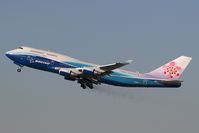 B-18210 @ LAX - China Airlines B-18210 departing RWY 25R.  Note the brake dust trailing from the main landing gear.