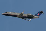 N916SW @ LAX - United Express N916SW departing RWY 25R.