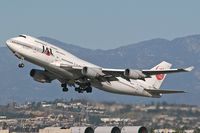 JA8076 @ LAX - Japam Airlines JA8076 departing RWY25R.