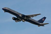 N595UA @ LAX - United Airlines N595UA climbing out from LAX RWY 25R. - by Dean Heald