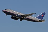 N841UA @ LAX - United Airlines N841UA (A319-131) climbing out from LAX RWY 25R on a clear afternoon in November 2005. - by Dean Heald