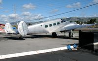 N118SA @ RHV - all silver Beech E18S at Reid-Hillview Airport (San Jose), CA - by Steve Nation