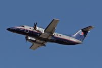 N294SW @ LAX - United Express N294SW (Embraer EMB-120ER) climbing out from LAX RWY 25R on a November afternoon. - by Dean Heald