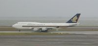 9V-SMM @ AKL - Taxiing to the runway for departure - by Micha Lueck