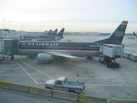 N421US @ CLT - A line-up of US Airways B737s at Charlotte, NC - by Micha Lueck