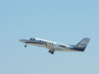 N265TS @ PDK - Departing PDK - Starting to rotate gear. - by Michael Martin