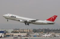 N638US @ LAX - Northwest Airlines N638US (1986 Boeing 747-251B) - FLT NWA1 departing LAX RWY 25R, on a cloudy day, for Narita International Airport (RJAA) - Tokyo, Japan.