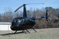N288RH - Chopper sitting in a grassy field off Riverside Drive in  Danville Va .3-10-06 with the Dan River about 300 ft. behind it.I saw it several times Friday flying over the city. - by Richard T Davis