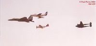 N61429 @ LFI - In the Right Wing position is a rare P-51C, painted in Tuskegee Airmen colors, followed by the even rarer P-38F, Glacier Girl