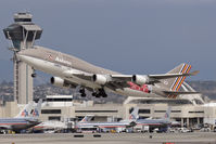 HL7423 @ LAX - Asiana HL7423 (FLT 281) departing LAX RWY 25R enroute to Incheon International Airport, Korea. Note the new graphic on the side of the fuselage behind the wing.