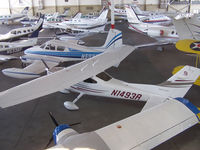 N1493R @ PDK - In Epps Air Service hanger with various other aircraft. - by Michael Martin