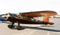 N237E - Black and orange (CAA colors) - by Bill Larkins