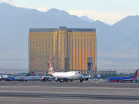 G-VROY @ LAS - Virgin Atlantic (G-VROY) / 2001 Boeing Company BOEING 747-443 / Preparing for an evening cruise in front of Mandalay Bay. - by Brad Campbell