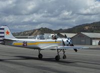 N6294D @ SZP - 1983 Yakovlev YAK 52, Vedeneev (Ivchenko) M-14P 360 Hp radial, post-flight shutdown, pilot wears parachute - by Doug Robertson