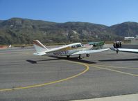 N8672P @ SZP - 1965 Piper PA-24-260 COMANCHE, Lycoming TIO-540-D 260 Hp, awaiting refueling - by Doug Robertson