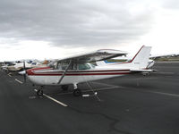 N734NG @ HWD - 1977 Cessna 172N at stormy Hayward Air Terminal, CA - by Steve Nation