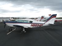 N8894P @ HWD - 1965 Piper PA-24-260 at stormy Hayward Air Terminal, CA