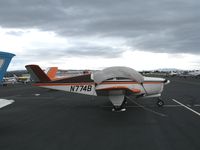 N774B @ HWD - 1956 Beech A35 at stormy Hayward Air Terminal, CA - by Steve Nation