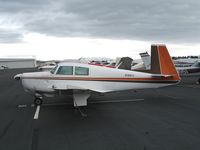 N7887V @ HWD - 1964 Mooney M20C at stormy Hayward Air Terminal, CA - by Steve Nation