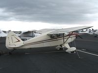 N7144D @ HWD - Piper PA-22-150 at stormy Hayward Air Terminal, CA - by Steve Nation